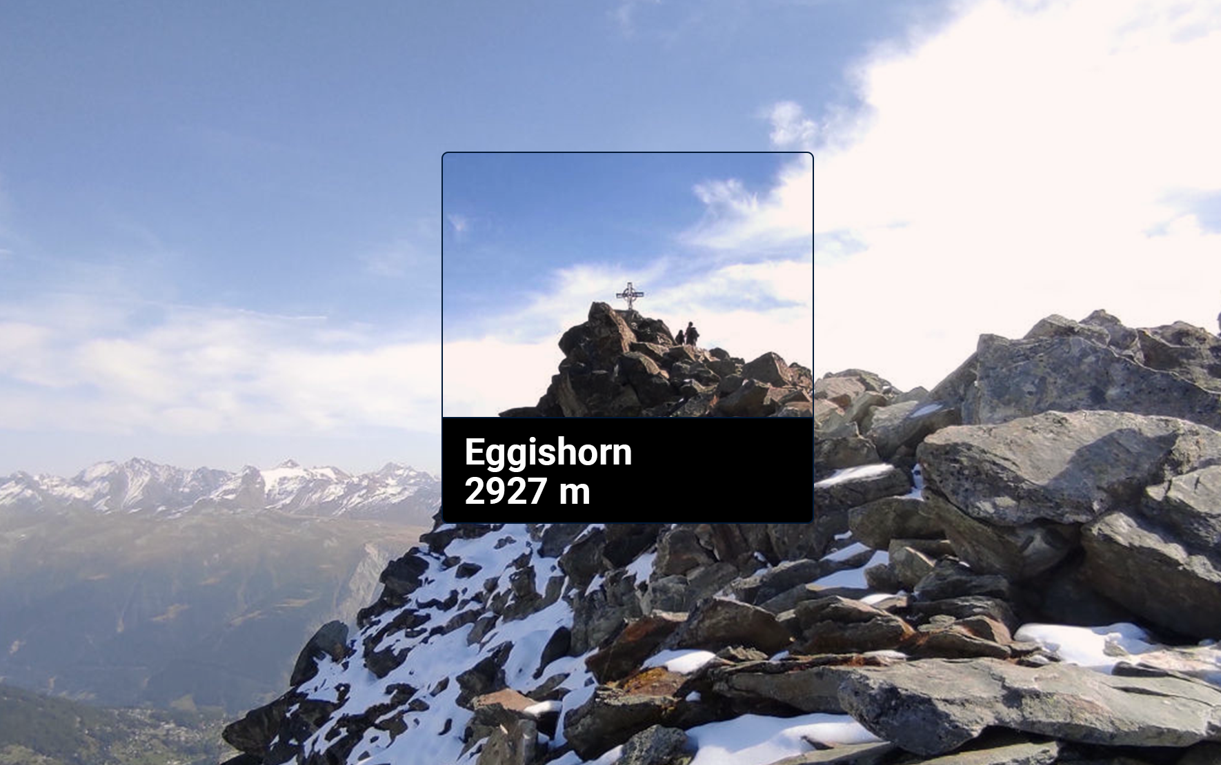 Ein Bild vom Gipfelkreuz auf der Spitze vom Eggishorn, aufgenommen beim Picturepark Firmenausflug. Lizenz: CC BY SA.